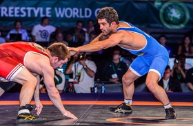 1428993315617_65_kg_-_brent_metcalf_usa_df._masmoud_esmailpour_iri_3-1a.jpg