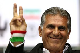 1440495337129_Iranian_Football_Team_Melli_Coach_Carlos_Queiroz_Victory_Sign_Iran_Flag.jpg