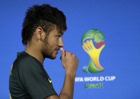 brazils-neymar-arrives-to-a-press-conference-one-day-before-the-group-a-world-c.jpg