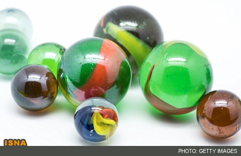 ترمیم پوسیدگی‌های دندان با تیله‌های شیشه‌ای