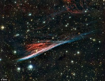 تصوير دراماتيك از يك سحابي به شكل جاروي جادوگران