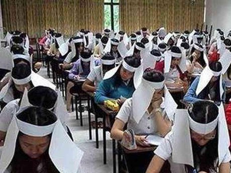 جنجال بر سر استفاده از «کلاه‌های ضدتقلب» در دانشگاه‌ تایلندی