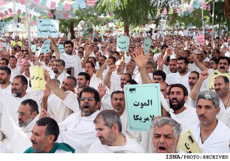 مراسم برائت از مشرکان در صحراي عرفات درحال برگزاري است